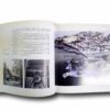 Photo showing a sample spread of the book Suomen arkkitehtuurin ääriviivat